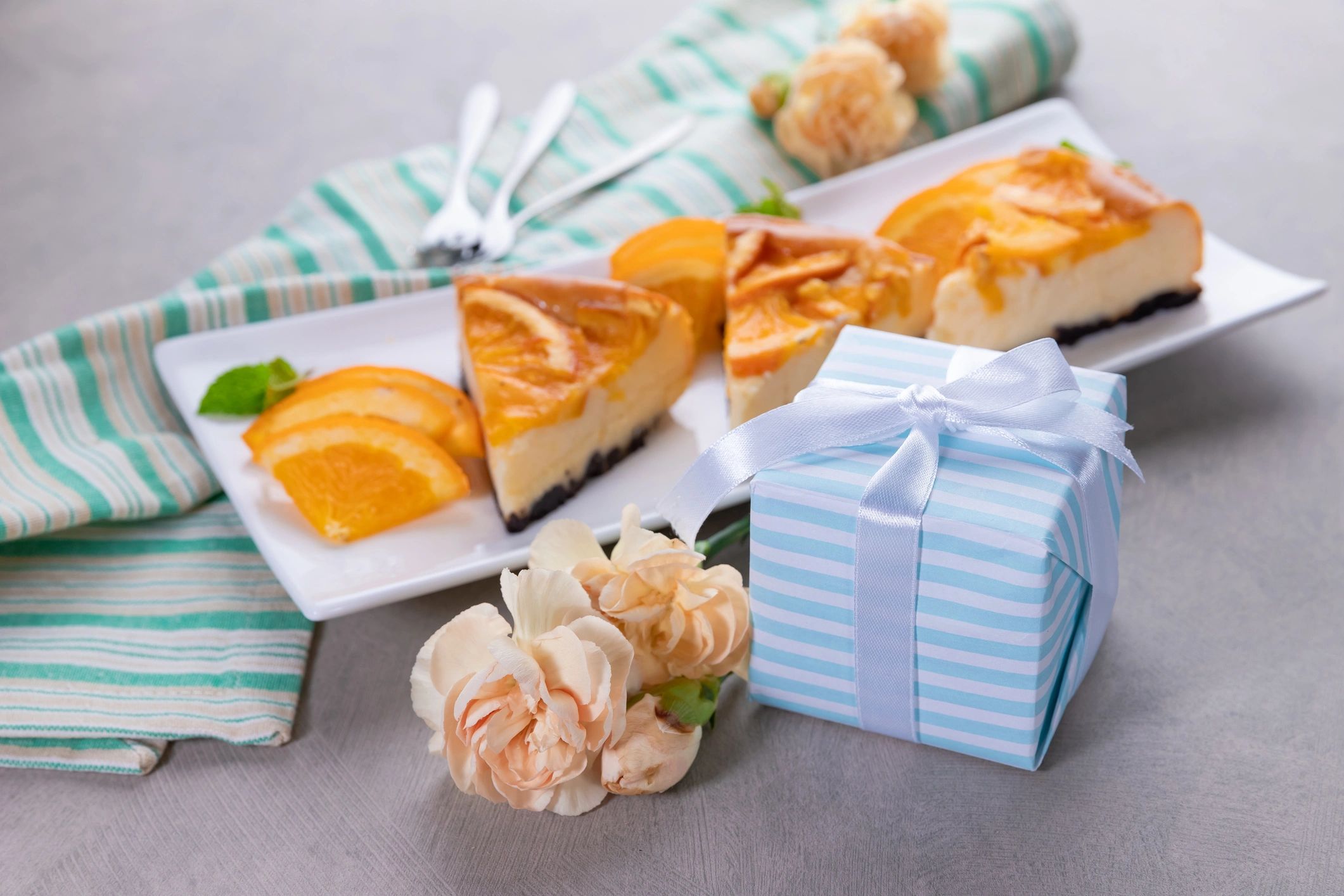 Gift box and cheese assortment representing gifting order