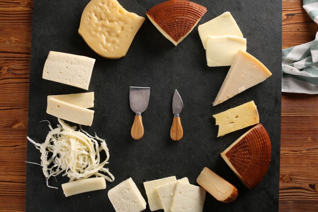 Various types of cheese with empty space background stock photo