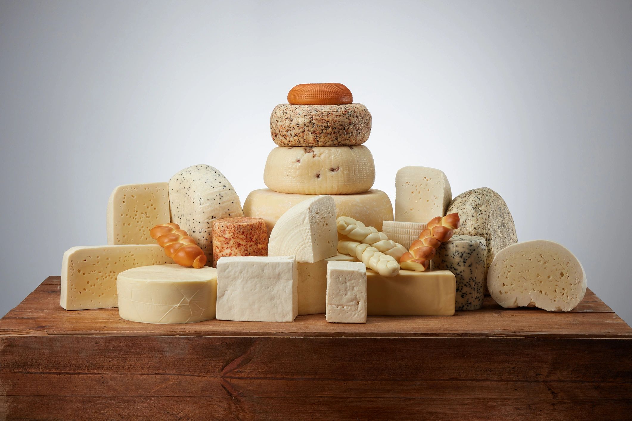 Assorted cheeses arranged for gourmet gifting